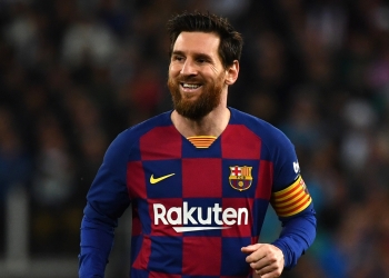 Barcelona's Argentine forward Lionel Messi smiles during the Spanish League football match between Real Madrid and Barcelona at the Santiago Bernabeu stadium in Madrid on March 1, 2020. (Photo by GABRIEL BOUYS / AFP) (Photo by GABRIEL BOUYS/AFP via Getty Images)