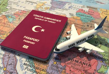 Turkish,Passport,And,An,Airplane,On,World,Map,3d,Illustration